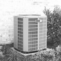 picture of American Standard heat pump outdoor next to home